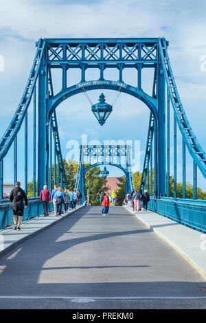 Pedestrians on Kaiser Wilhelm Bridge, a swing bridge from 1907, at Wilhelmshaven, Germany Stock Photo