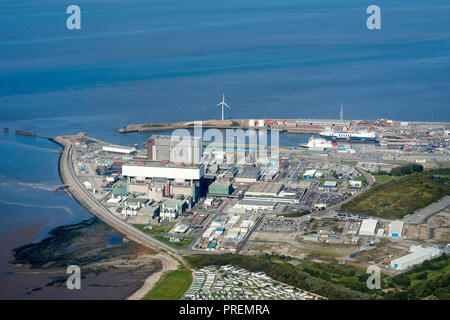 An aerial photo of Heysham Port, north west England, UK, on the edge of Morecambe bay, Isle of Man ferry in port, Nuclear power station prominent Stock Photo