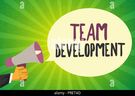 Handwriting text writing Team Development. Concept meaning learn why and how small groups change over time with graphs. Stock Photo