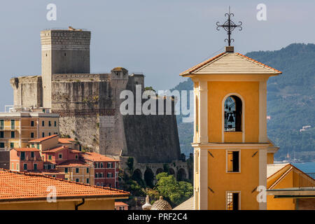 View of the bell tower of the Church of San Francesco with the Castle of Lerici in the background, La Spezia, Liguria, Italy