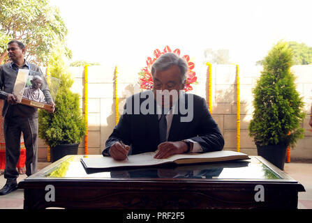 New Delhi, India. 02nd Oct, 2018. Antonio Guterres, secretary General of the United Nation writing his Remarks after paying a floral tribute in the visiting Book at Mahatma Gandhi's Samadhi (memorial), on Tuesday 2nd October 2018, in New Delhi, This year India Celebrating 150 years of birth of Mahatma Gandhi, father of the Nation. UN secretary General Antonio Guterres visits India to Pay tribute T Mahatma Gandhi on his 150th birth anniversary Credit: Ranjan Basu/Pacific Press/Alamy Live News Stock Photo