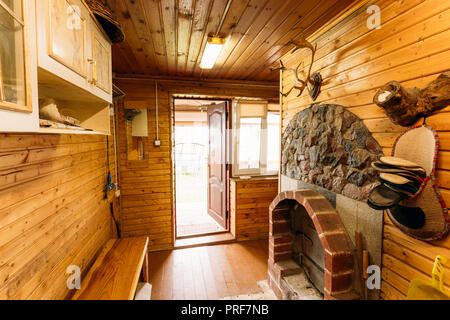 Dressing Room Or Cloakroom In Russian Bath Or Interior Of Sauna. Decoration On Wooden Walls. Nobody Stock Photo