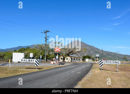 Rural railway crossing near Gordonvale, South of Cairns, Far North Queensland, FNQ, QLD, Australia Stock Photo