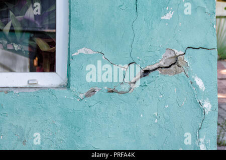 House wall with a crack, destroying dwelling house, the alarm state Stock Photo