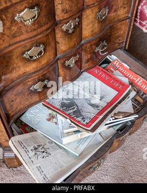 Vintage newspapers in drawer of chest Stock Photo