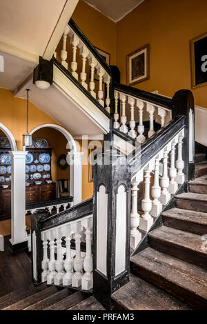 Black and white paintwork on banister staircase Stock Photo