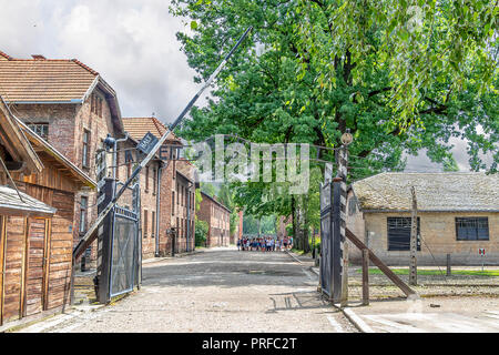 The main gate of the concentration camp Auschwitz with the inscription work makes you free. Stock Photo