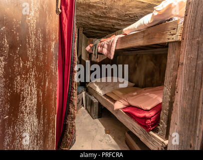 Krakow, Poland - June 3, 2018: Original jewish workers bedroom in Oskar Schindler factory. Inside Oskar Schindler's Enamel factory museum Stock Photo