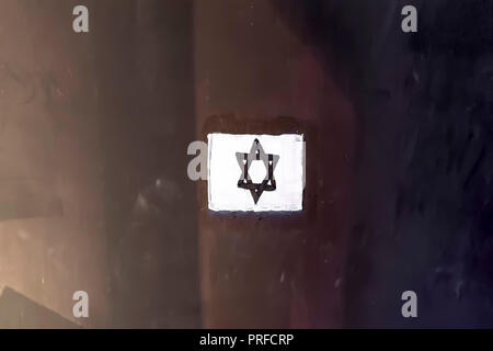 Shoulder patch Jewish star of David in concentration camps in Germany. Jewish badge Stock Photo