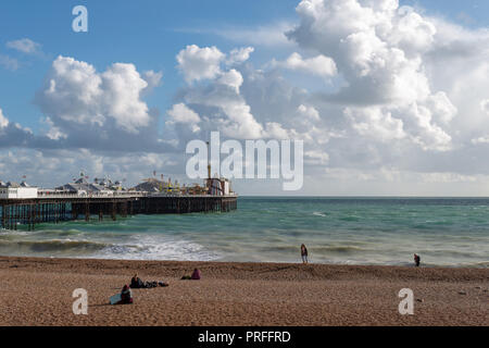 A sunny day on Brighton beach and seafront in Sussex, UK. Stock Photo