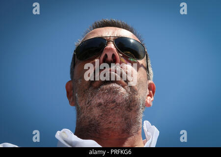 Headshot portrait of tanned middle aged man Stock Photo