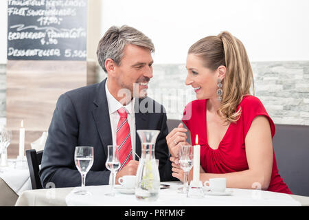 Couple having date in restaurant Stock Photo