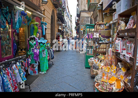 Souvenir shops at a narrow alley, old town of Sorrento, Peninsula of Sorrento, Gulf of Naples, Campania, Italy Stock Photo