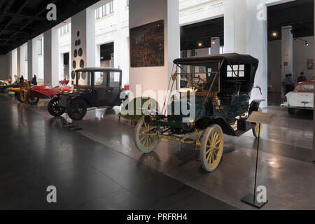 Museo Automovilistico y de la Moda, Malaga, Malaga Province, Spain.  Automobile and Fashion Museum.  The vehicle in the foreground is a Stanley Steame Stock Photo