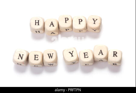 happy new year letters wooden blocks isolated on white Stock Photo