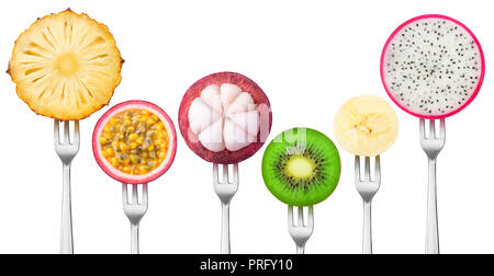 Isolated tropical fruits. Slices of pineapple, passion fruit, mangosteen, kiwi, banana and dragon fruit on dessert forks isolated on white background  Stock Photo