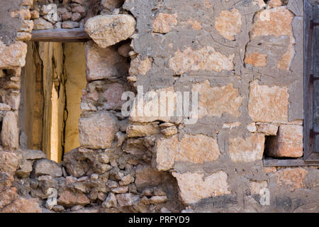 Landscape with ruins of old house against blue sky. Historical place, remains of the stone house where one of the first settlers lived in Turkey Stock Photo