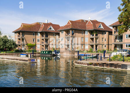 Exterior of the Eights Marina with apartment blocks overlooking moored boats in the marina, Cambridge, UK Stock Photo