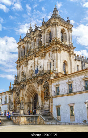 Facade of Roman Gothic Monastery of Alcobaca or Mosteiro de Santa Maria de Alcobaca, Unesco Heritage in Alcobaca, Portugal. Stock Photo