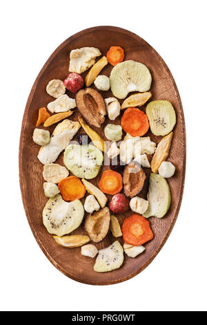 Aerial crispy snack from fruits and vegetables processed by vacuum drying, top view. Food isolated on white background Stock Photo