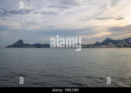 Rio de Janeiro skyline view from Guanabara bay with Sugar Loaf and Corcovado Mountains - Rio de Janeiro, Brazil Stock Photo