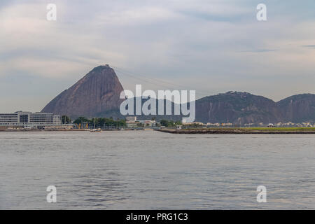 Sugar Loaf Mountain view from Guanabara Bay and Rio de Janeiro Airport - Rio de Janeiro, Brazil Stock Photo