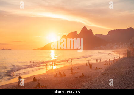 Ipanema Beach and Two Brothers (Dois Irmaos) Mountain at sunset - Rio de Janeiro, Brazil Stock Photo