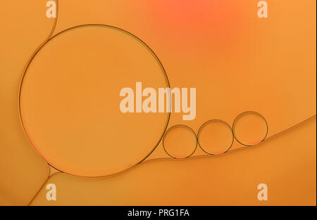 A photo of oil drops on a water surface, Macro photo. Stock Photo