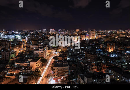 A photo of Gaza City at night. Stock Photo