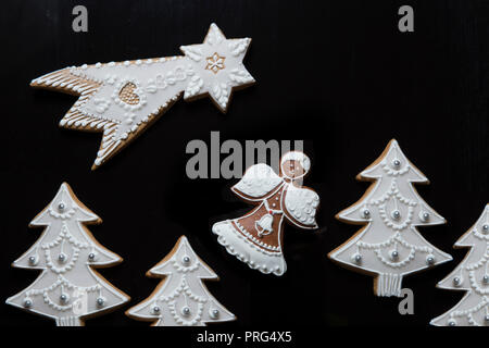 Christmas gingerbreads isolated on black background Stock Photo
