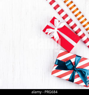 Overhead view of two gift boxes tied with a red ribbon Stock Photo