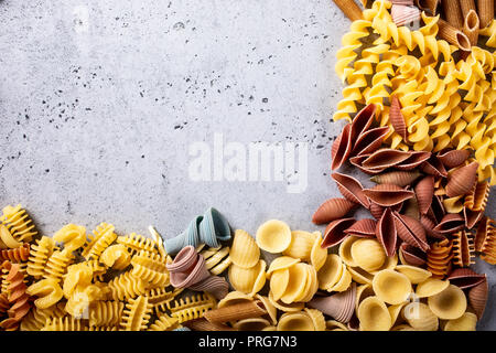 Assorted colorful italian pasta Stock Photo