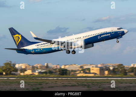 Ryanair Boeing 737-8AS [REG: EI-DCL] in special Boeing colors, taking off in the late evening. Stock Photo