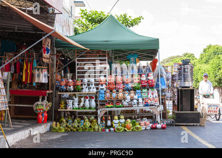 Artisanal handicraft, clay made figures for sale in street stall, Caacupe, Cordillera Department, Paraguay Stock Photo