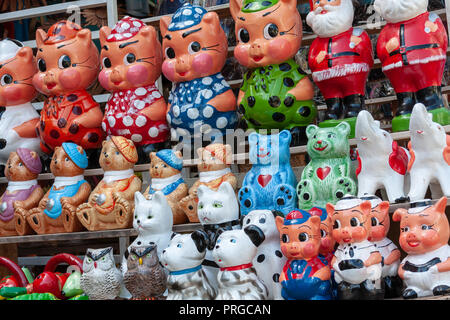 Artisanal handicraft, clay made figures for sale in street stall, Caacupe, Cordillera Department, Paraguay Stock Photo