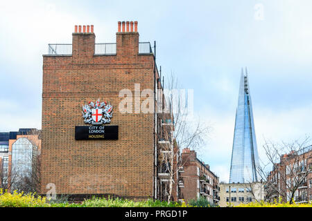 City of London housing estate in Great Guildford Street, Southwark, London, UK, the Shard in the background Stock Photo