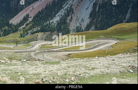 Barskoon Gorge,  Beautiful view of the mountains, Kyrgyzstan,  Central Asia, Truck with load down mountayn road Stock Photo