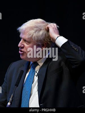 Birmingham. 2nd Oct, 2018. British former foreign secretary Boris Johnson speaks at a Conservative home fringe meeting on day three of the Conservatives Party annual conference 2018 in Birmingham, Britain on Oct. 2, 2018. British former foreign secretary Boris Johnson on Tuesday called on the Prime Minister Theresa May to abandon her Brexit plan for a future trading deal with the European Union (EU). Credit: Han Yan/Xinhua/Alamy Live News Stock Photo