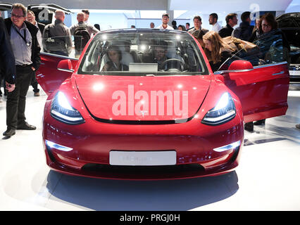 Paris, France. 02nd Oct, 2018. 02 October 2018, France, Paris: A Tesla Model 3 will be presented at the Paris International Motor Show on the 1st press day. From 02 October to 03 October 2018 the press days will take place at the Paris Motor Show. It will then be open to the public from 04 October to 14 October 2018. Credit: Uli Deck/dpa/Alamy Live News Stock Photo