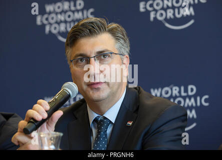 Geneva, Switzerland. 2nd Oct, 2018. Croatian Prime Minister Andrej Plenkovic attends a press conference after Strategic Dialogue on the Western Balkans at the World Economic Forum (WEF) headquarters in Cologny near Geneva, Switzerland, Oct. 2, 2018. Leaders from the Western Balkan countries and neighboring countries on Tuesday set out measures to continue dialogue and cooperation to ensure regional stability and boost economic growth and competitiveness. Credit: Xu Jinquan/Xinhua/Alamy Live News