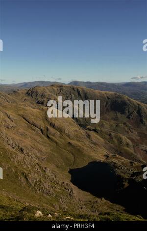 The Old Man of Coniston and Wetherlam from Carron Crag Grizedale Forest ...