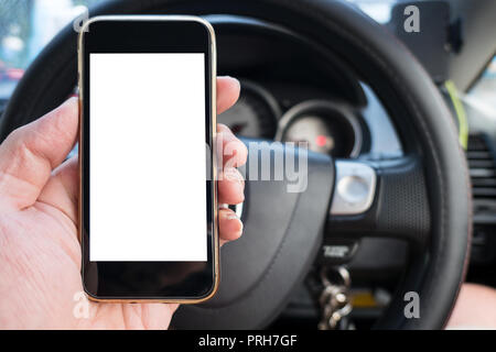 hand hold smartphone blank screen while driving car smart vehicle device concept Stock Photo