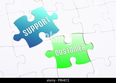 The Words Customer And Support In A Missing Piece Jigsaw Puzzle Stock Photo