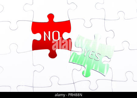 The Words Yes And No In A Missing Piece Jigsaw Puzzle Stock Photo