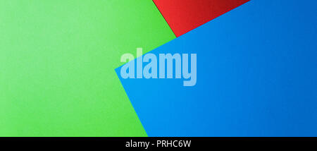 Banner, Multi colored abstract paper of pastel colors, with geometric shape, flat lay. Stock Photo