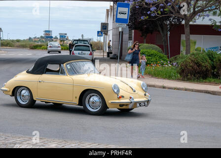 Cream Yellow 1950's Porsche 356 A Convertible Vintage Sportscar front right passenger view of yellow cream colour porsche 356A convertible soft top ra Stock Photo