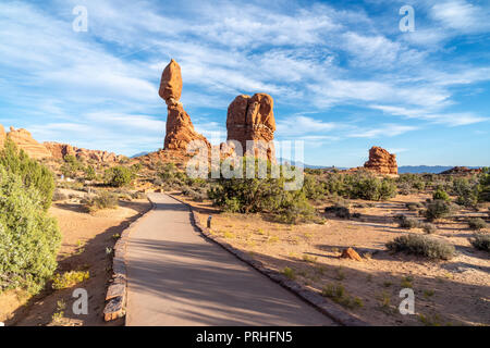 Balanced Rock at the end of a footpath, Arches National Park, Utah Stock Photo