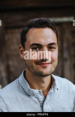 headshot of handsome caucasian man outdoors Stock Photo