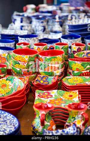 Colourful Spanish pottery sold at a stall in Avinguda del Portal de l'Àngel, Barcelona, Spain Stock Photo