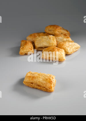 Khari Biscuits, puffs on a grey background Stock Photo